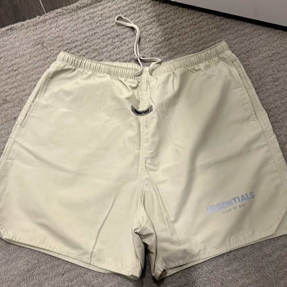 Brand new Essentials men’s Large taupe shorts.